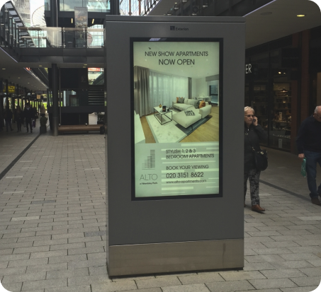 Digital signage in retail store showcasing promotions and product advertisements.